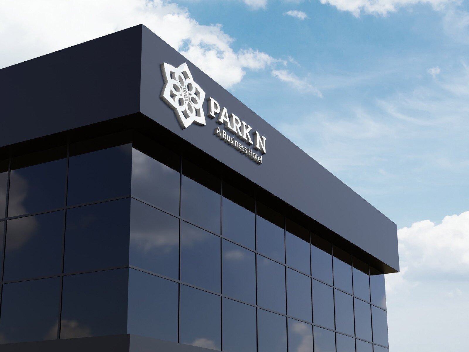 Park N hotel logo signage on a modern glass building facade