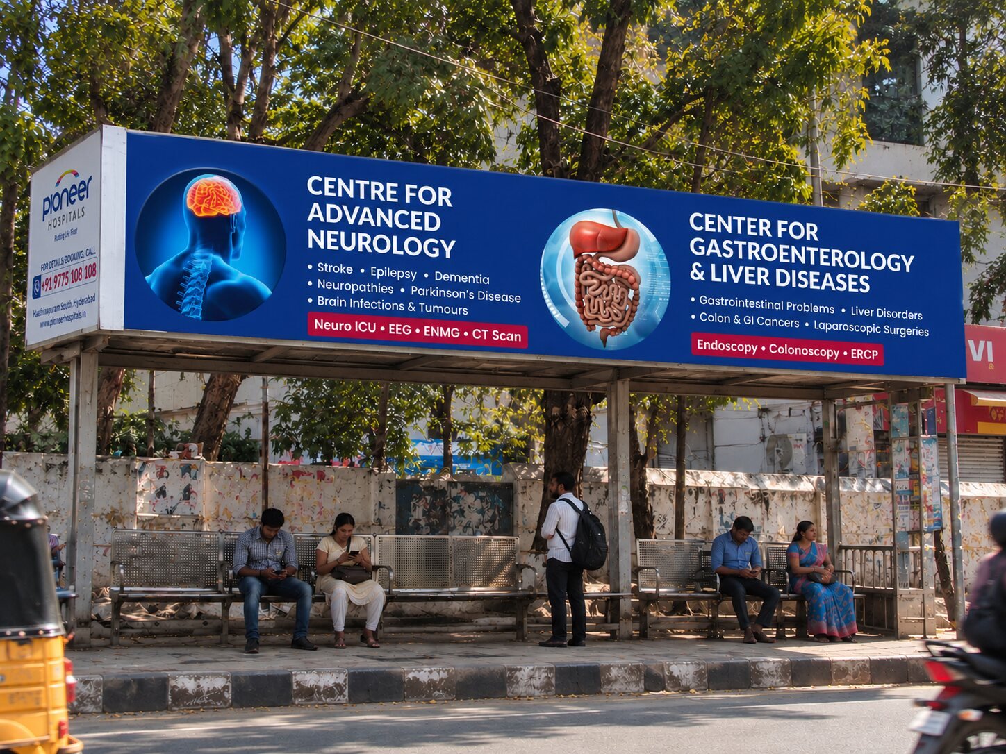 Pioneer Hospitals neurology and gastroenterology bus shelter branding with commuters waiting